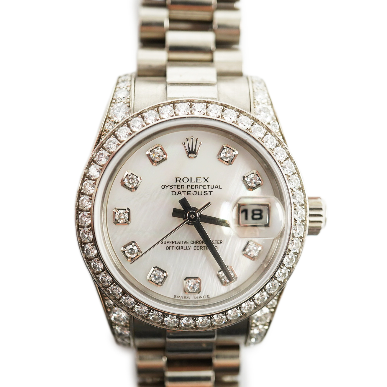 A lady's 2006 18ct white gold and diamond Rolex Oyster Perpetual Datejust wrist watch, on an 18ct white gold Rolex bracelet with deployment clasp